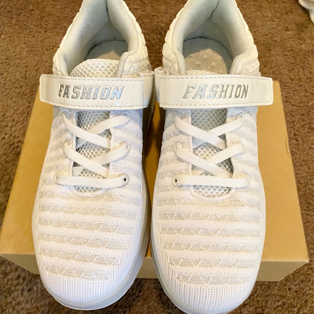 New in box roller sneakers! Size 40